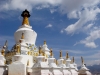 sha-white-stupas-blue-sky.jpg